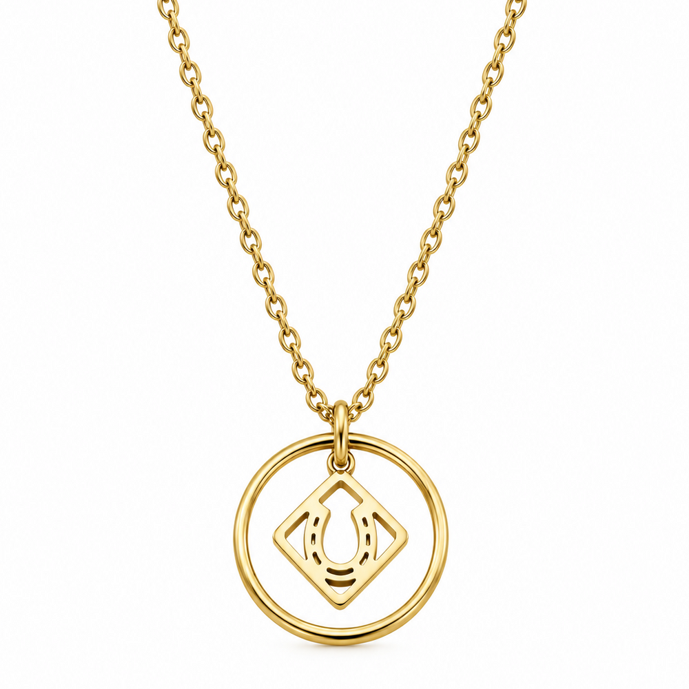 Gold chain necklace with a circular pendant containing a diamond-shaped cut-out.